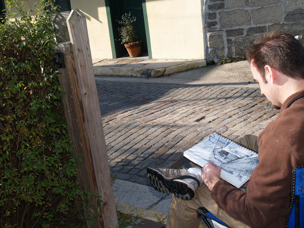 Michael finishing his drawing from last week