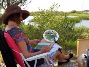 Jean working on her painting from last week