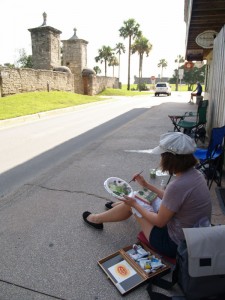 Jean painting the distant fort